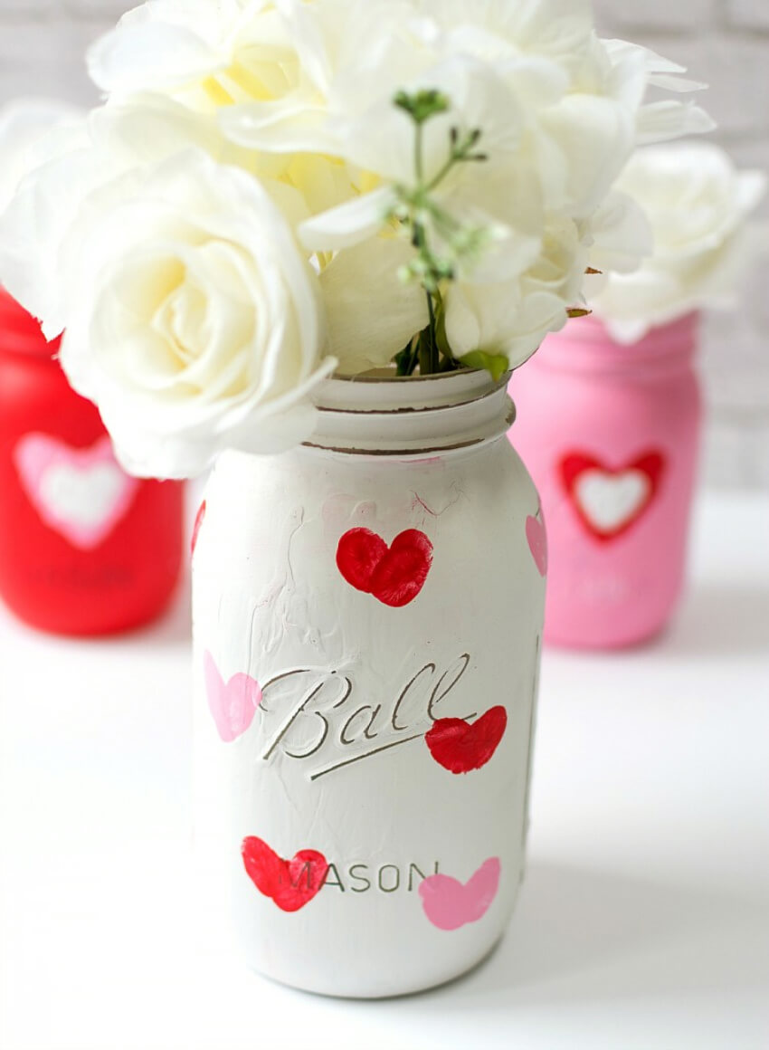 Mason jars are easy to customize for a decorative Valentine’s bouquet. Source: It All Started With Paint