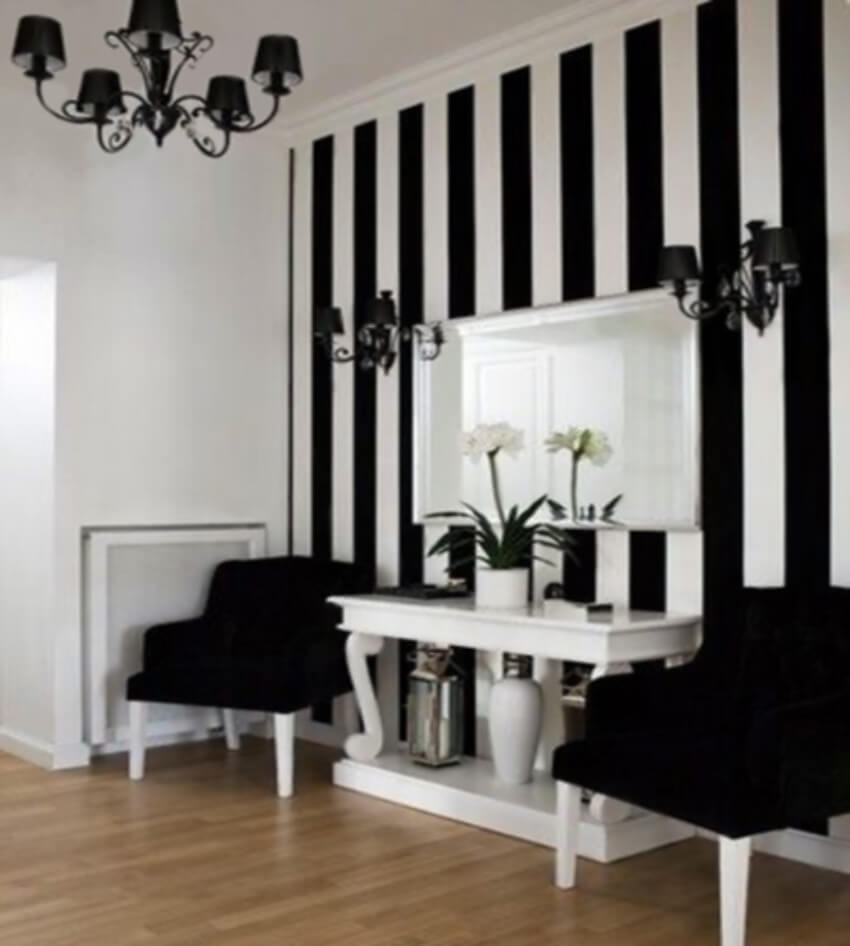Stripes on the wall will make your ceiling look higher.