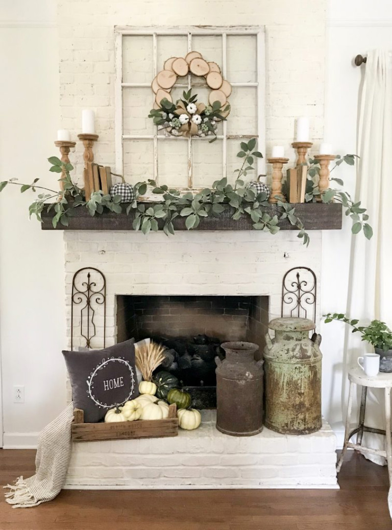 An assortment of leaves, copper items and gourds are perfect for the mantel. Source: Bless This Nest