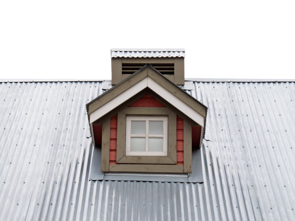 Roof of a house showing the metal roof flashing system.