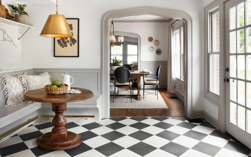 Checkered flooring looks gorgeous on an entryway. Source: Coco Kelly