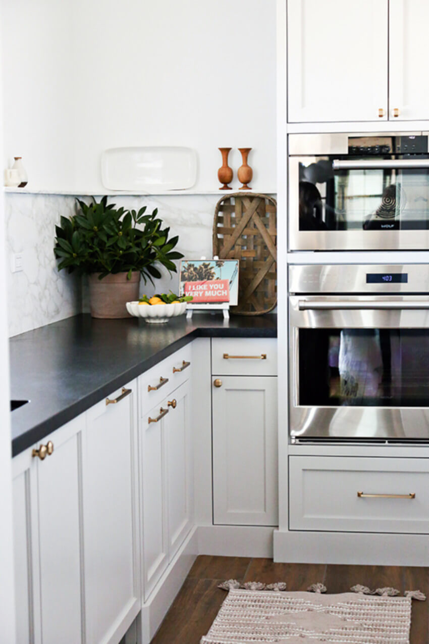 Give your cabinets a new look with some paint and new hardware.