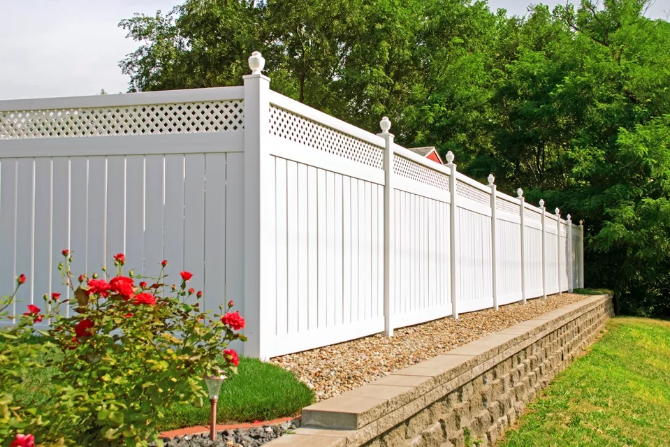 The classic white vinyl fence is adored for a good reason. Source: The Spruce