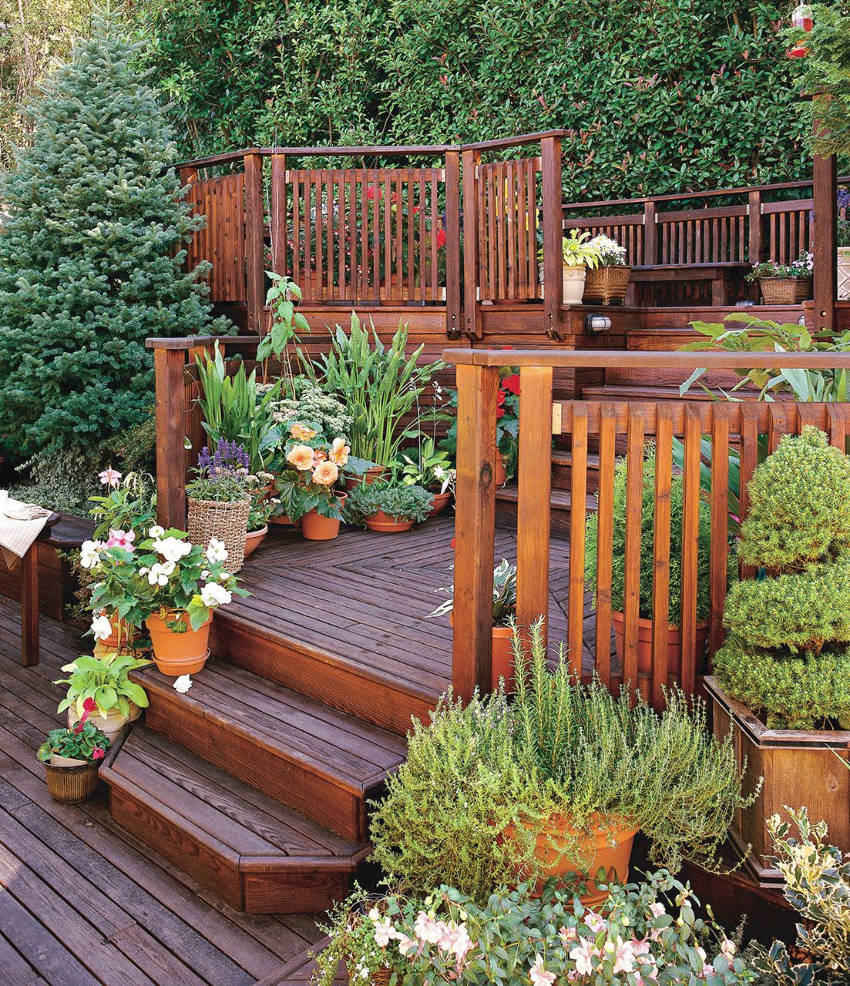 Wood is the perfect complement to greenery. Source: BHG