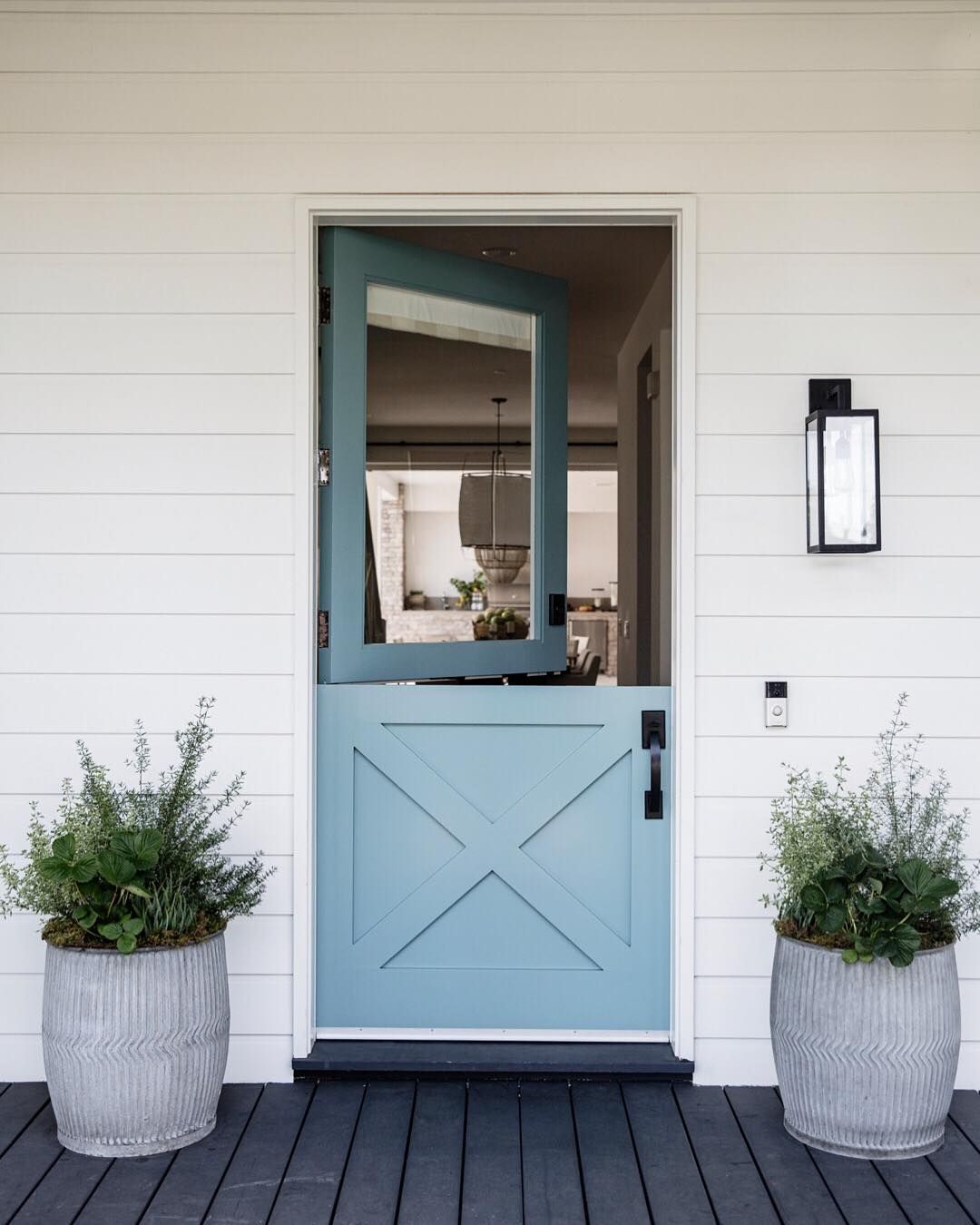 A Dutch door can be the perfect barrier between your house and the backyard. Source: Design The Furniture