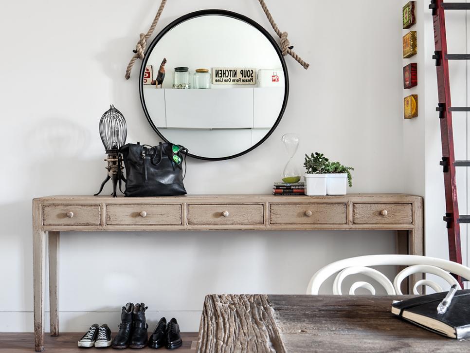 A mirror is very practical on the entryway. Source: HGTV