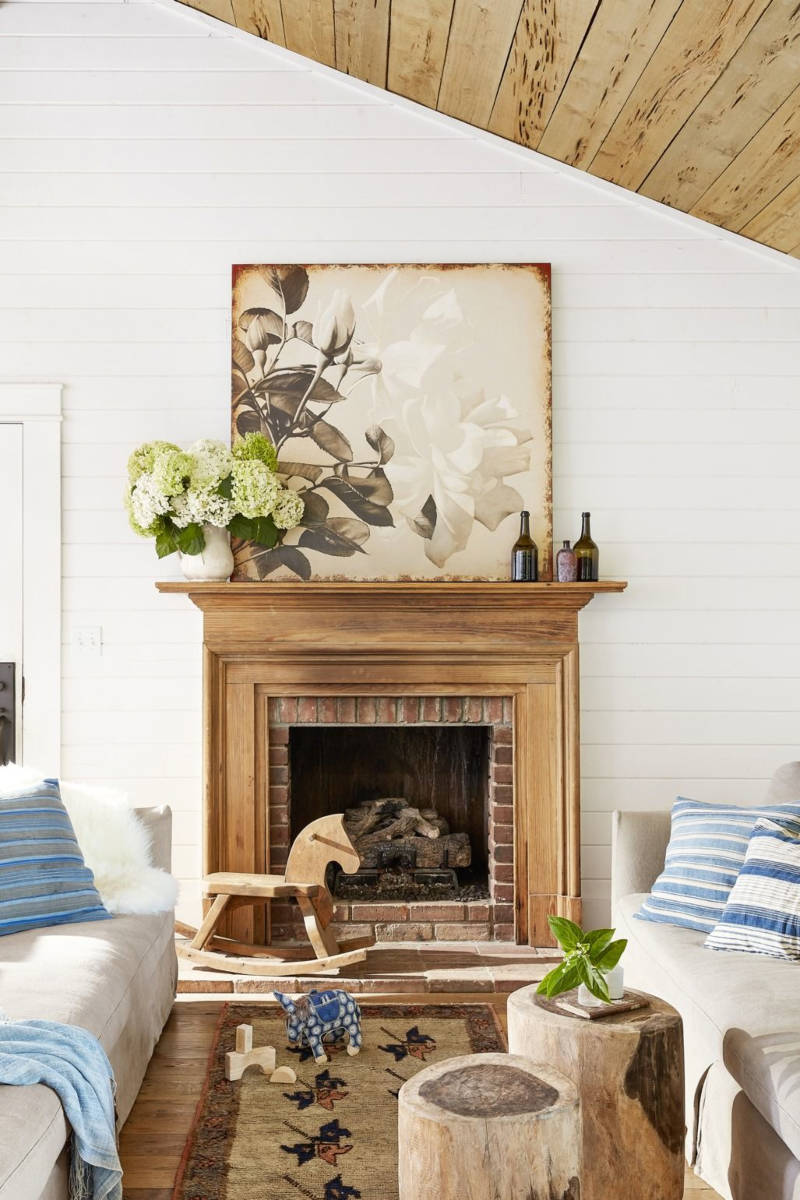 The mantle is a great place to display artwork. Source: Country Living