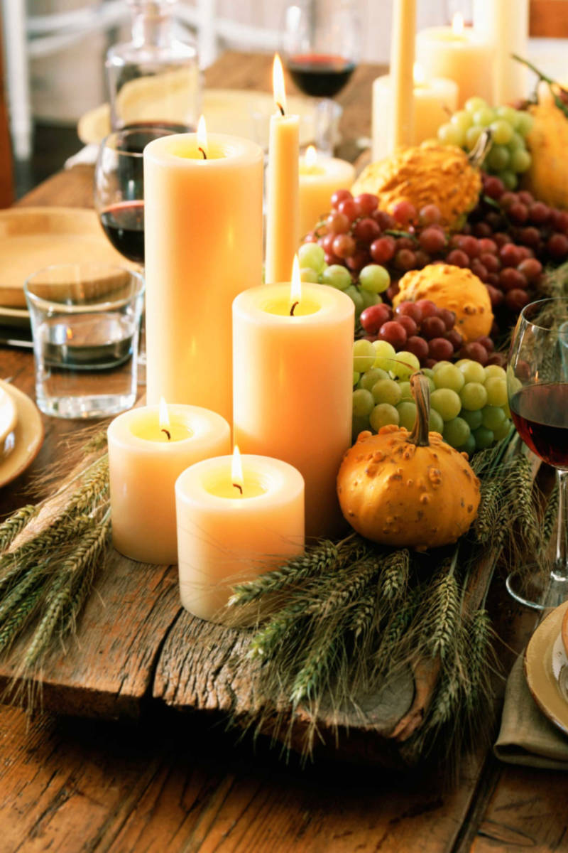 Candles are an excellent resource for centerpieces. Source: Woman’s Day