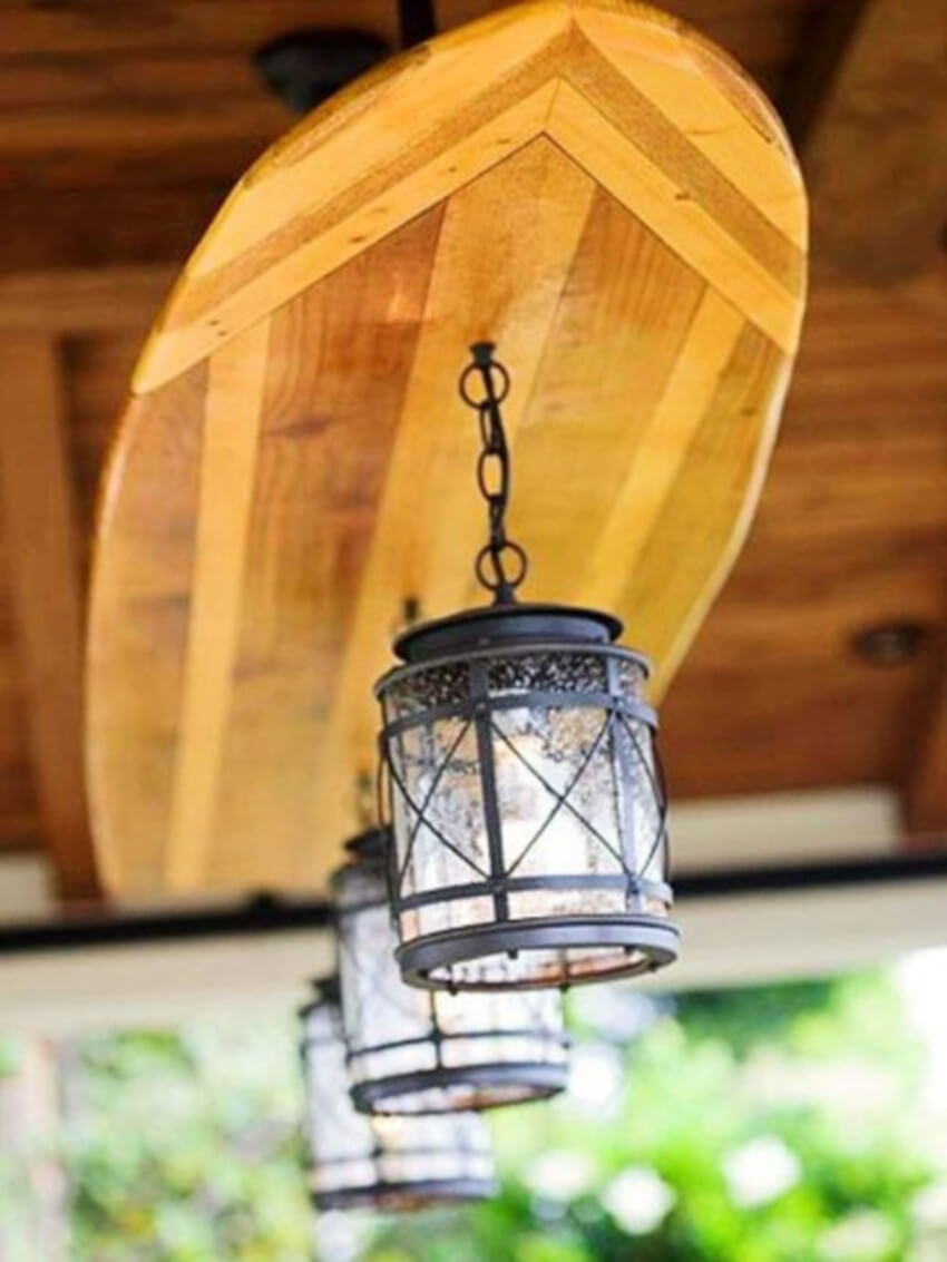 Beautiful light holder from a repurposed surfboard.