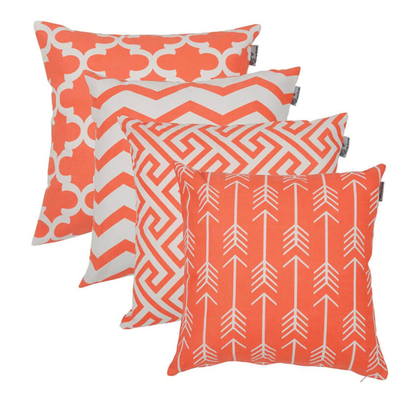 Coral and patternet coral throw pillows.