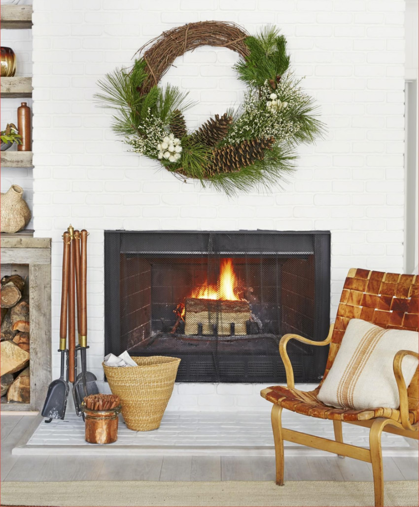 The fireplace doesn’t need much to look beautiful. Source: Country Living