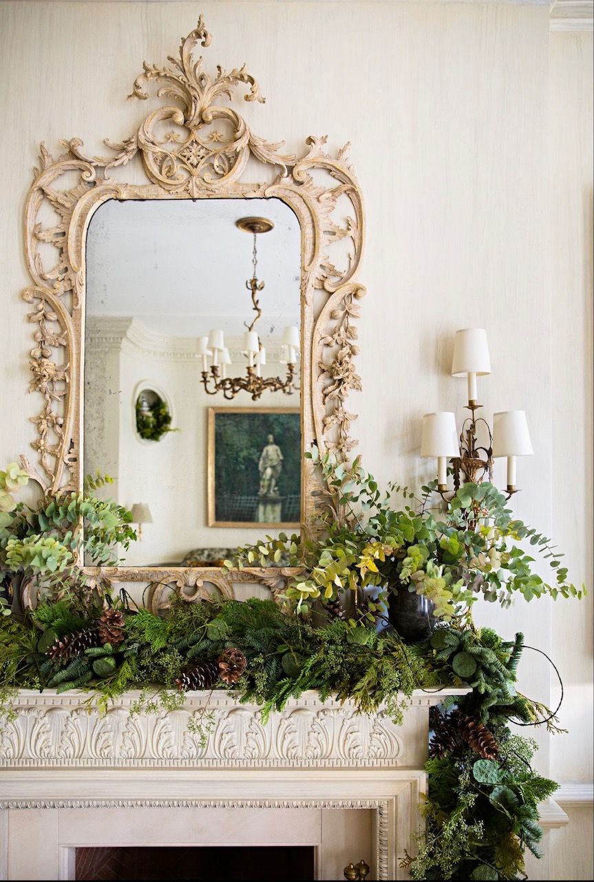 An antique mirror frame with greenery. Source: Elle Decor