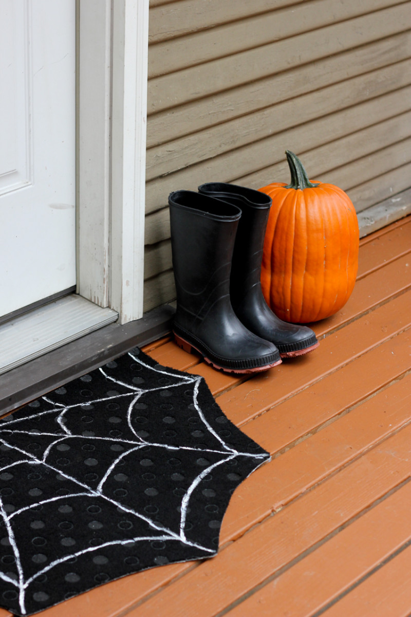 All you need is white paint and a black doormat! Source: Delia Creates
